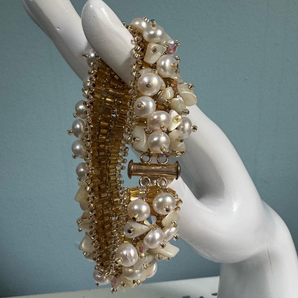 Gold filled cultured flat pearl and mother of pearl bracelet.